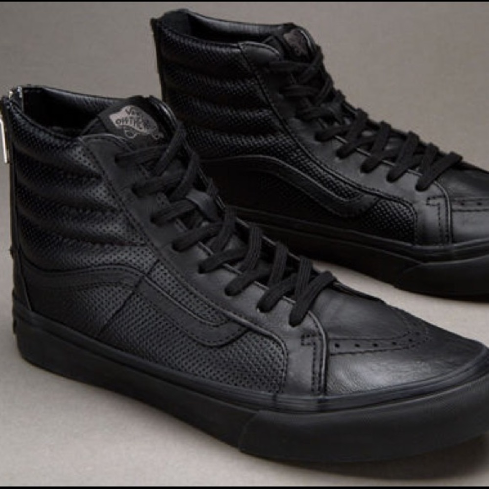 High top, leather, all black vans.